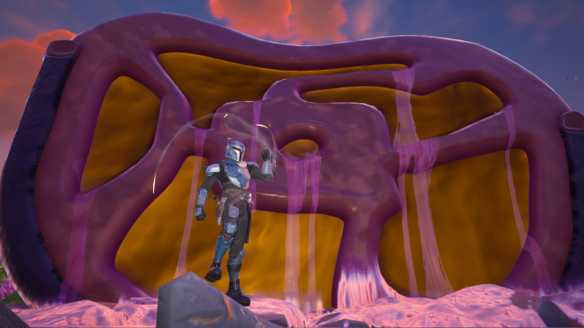 A mandalorian standing in front of a tentacle in fortnite
