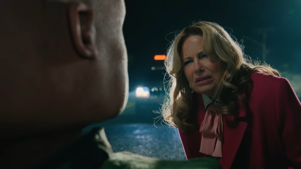 Marlene looking at a villager in A Minecraft Movie. 