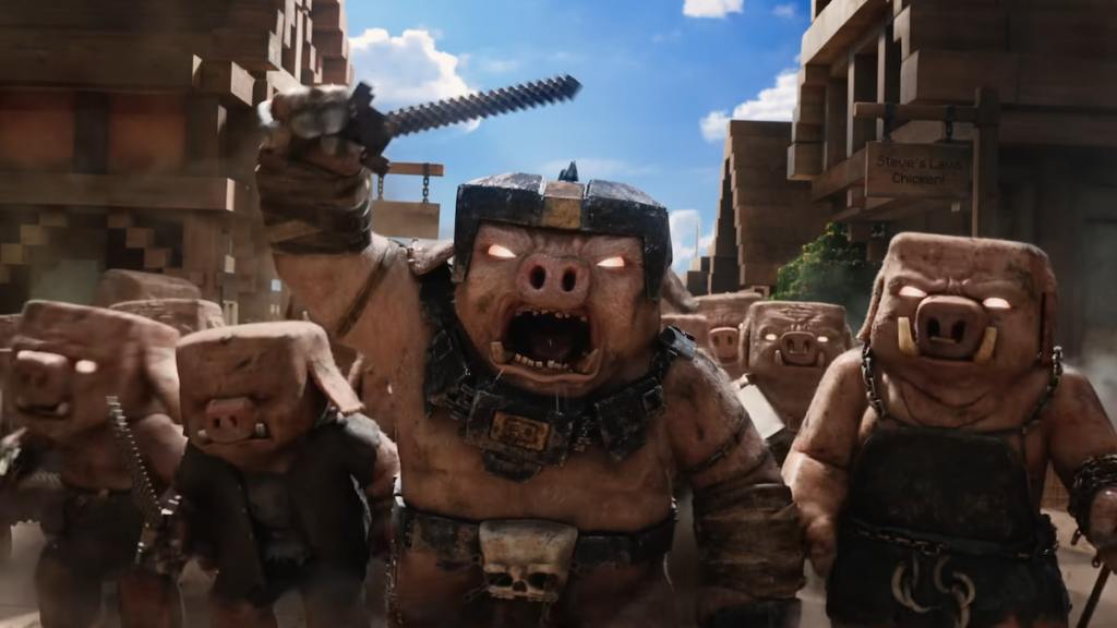 An army of piglins with one holding up a sword and yelling in A Minecraft Movie. 